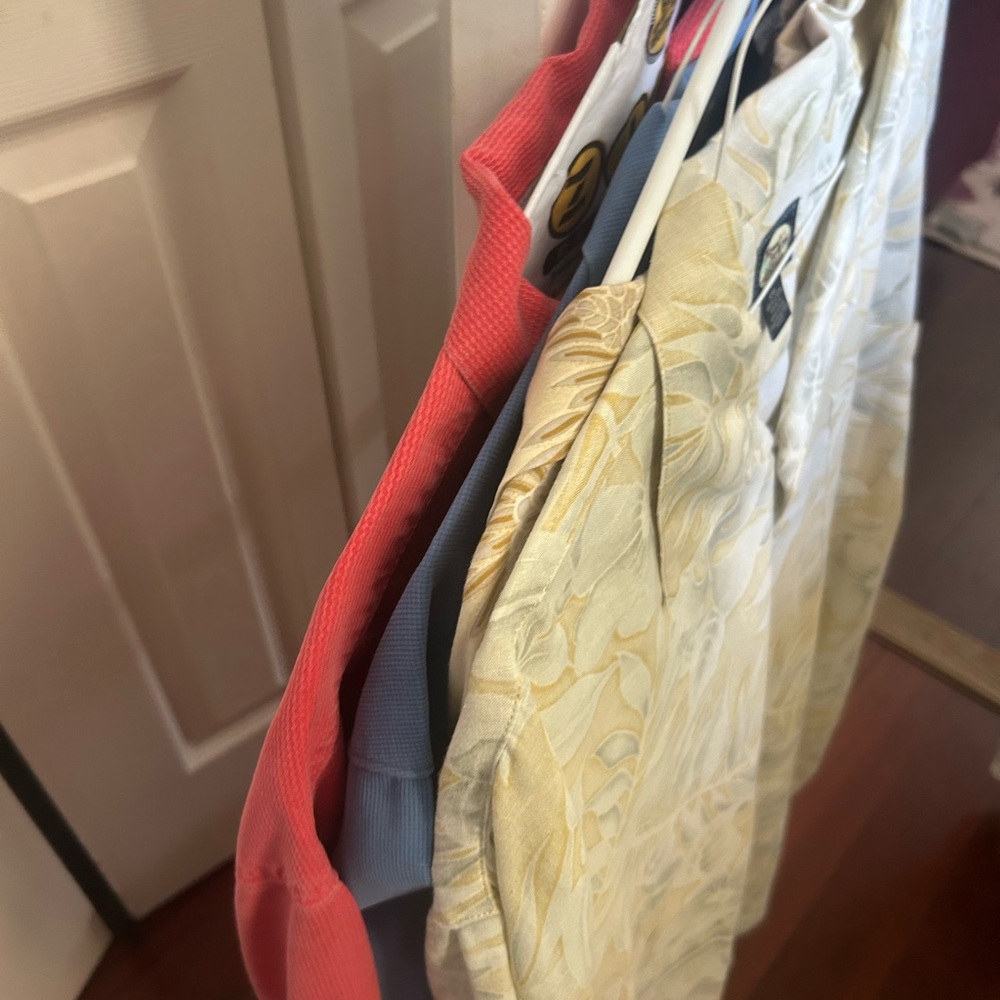 Four Tommy Bahama xxl men’s shirts.